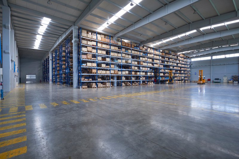Military warehouse with shelves stacked with boxes that can be scanned using rugged mobile technology